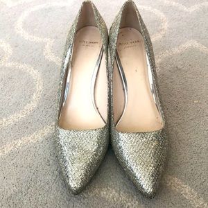 Gold sparkling Cole Haan pumps size 8.5. Good condition w little wear and tear.